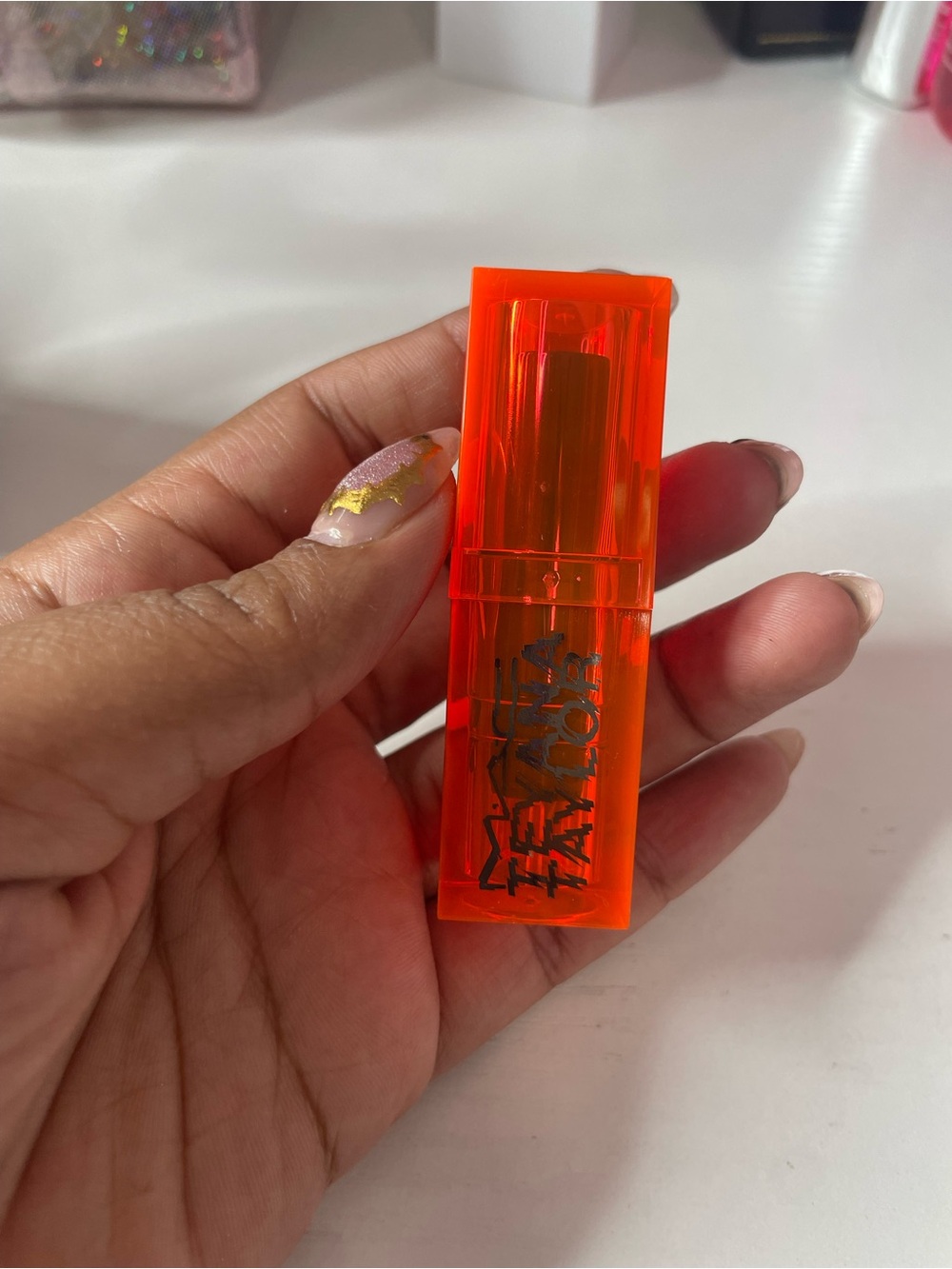 MAC Teyana Taylor Neon Orange packaging Nude Lipstick Tube